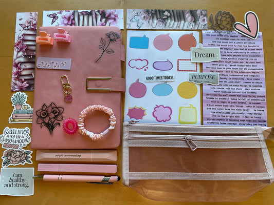 Bookish stationery gift box in soft pink with A5 planner, pen, stickers, bookmarks, keychain, pencil case, and accessories — perfect gift for journaling, study, or work.
